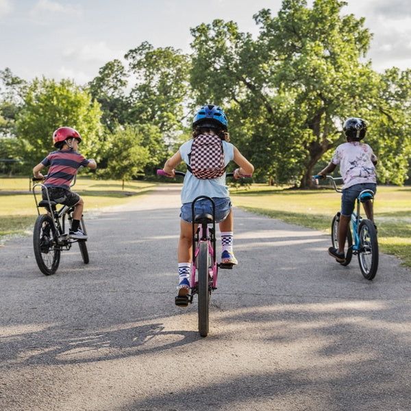 Kids riding bikes to school.