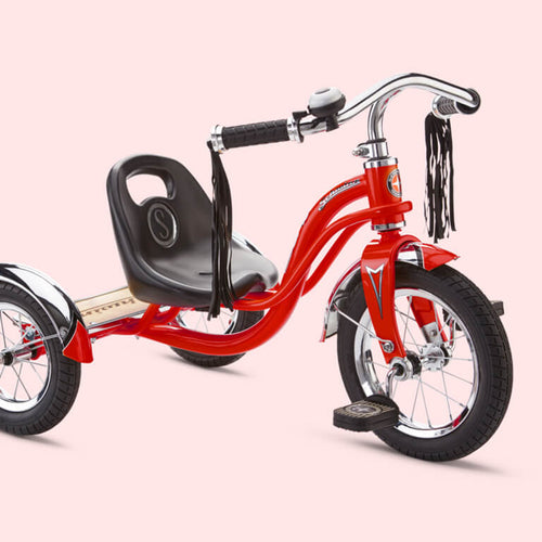 A schwinn roadster tricycle.