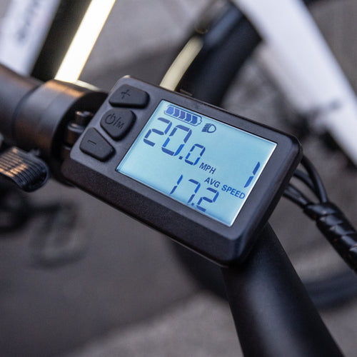 An E-bike display showing top speed and average speed.